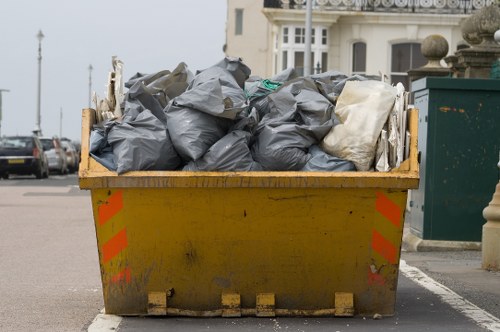 Rubbish clearance team removing items in South West London