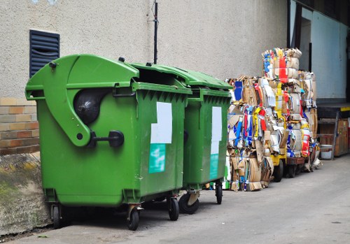 Waste collection trucks servicing a South West London business area