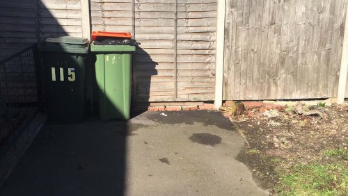 Recycling bins with assorted business waste materials